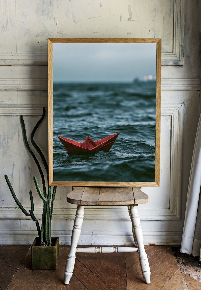 Red Paper Boat at Sea Photography Poster. room preview