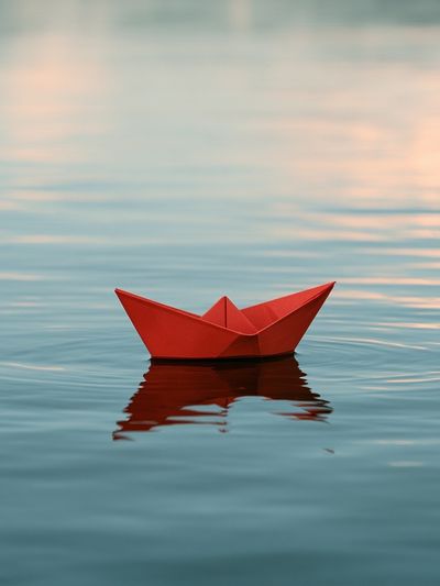 Red Paper Boat Photography Poster. poster