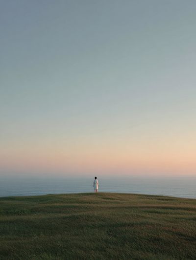 Solitary Figure at Dusk — Photography Print. poster