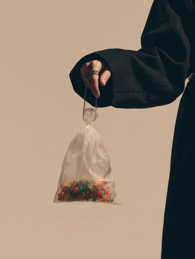Minimalist Hand with Candy Bag Poster.
