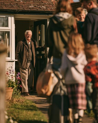 Smiling Man at Door Photography Poster.