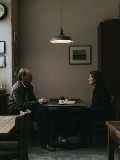 Quiet Café Conversation Photography Poster. poster