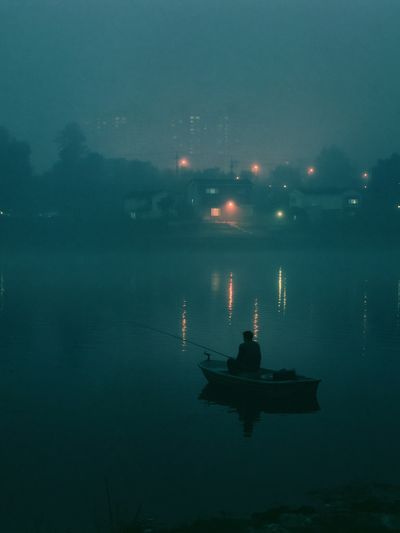 Foggy Fisherman at Dusk Poster.