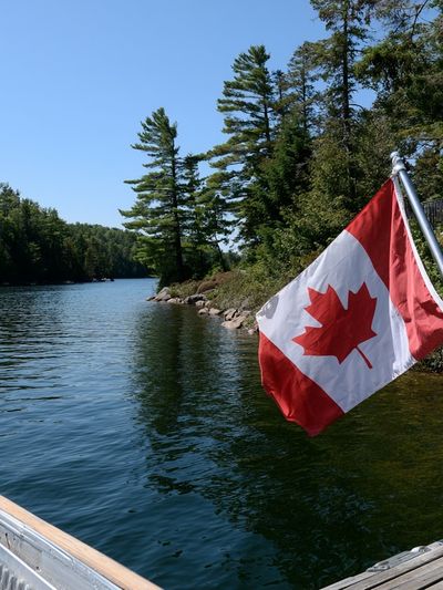 Canadian Lakeside Flag Photography Poster. poster