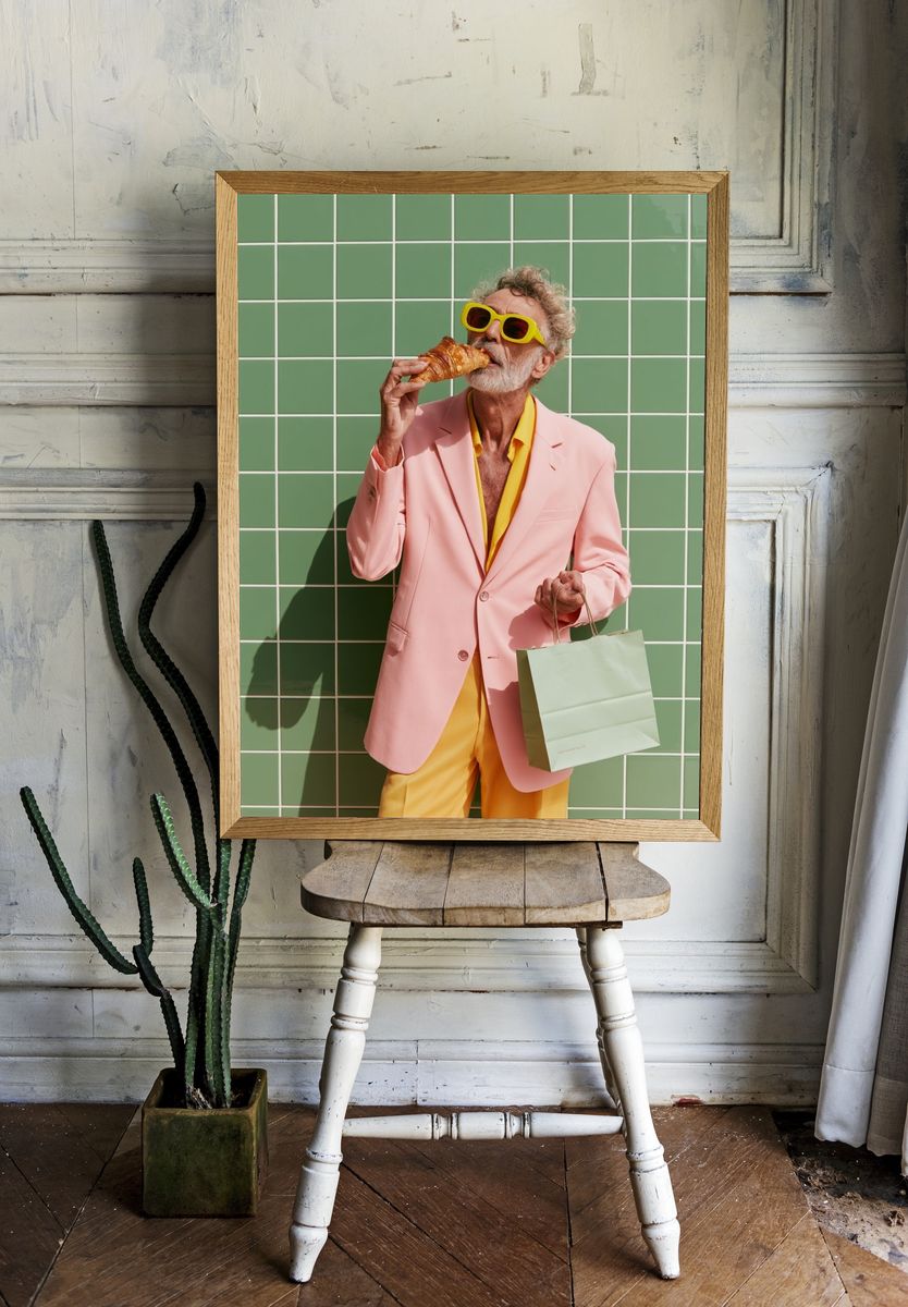 Stylish Man with Croissant Photography Poster. — room view 1