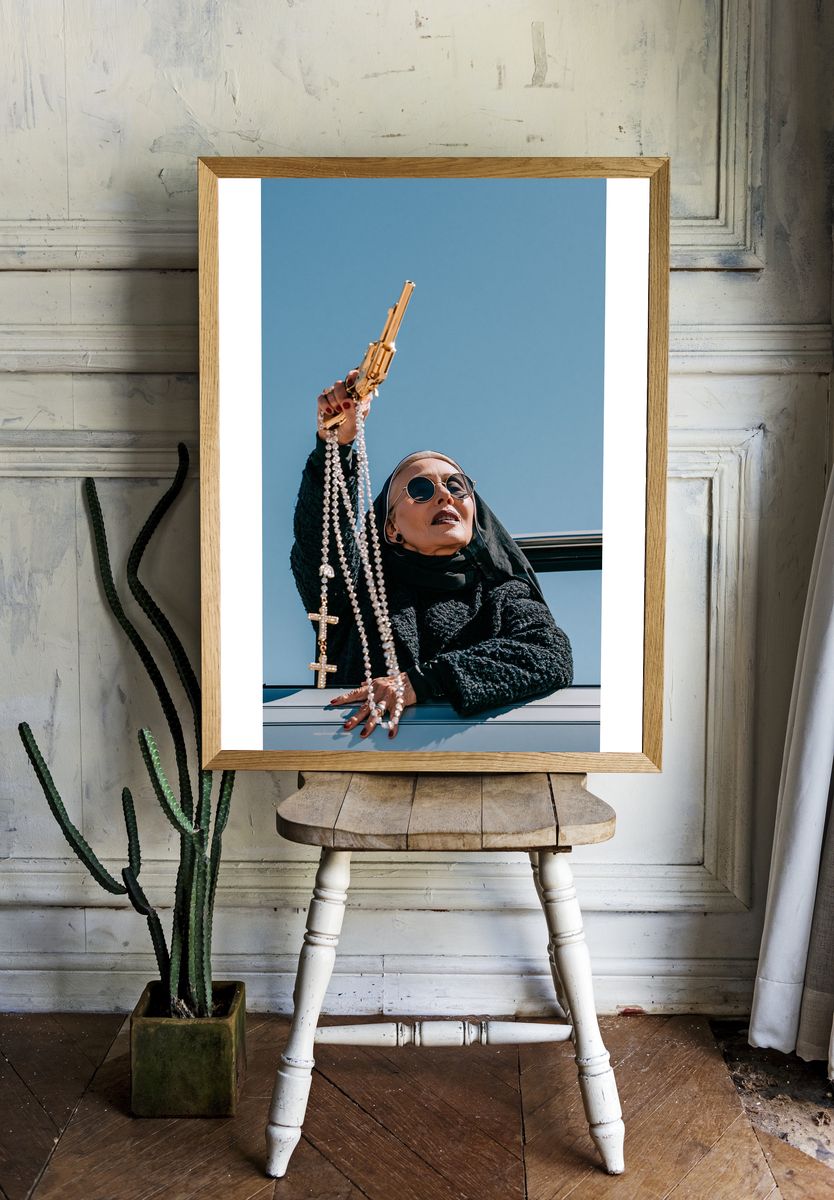 Nun with Gold Gun Photography Poster. room preview