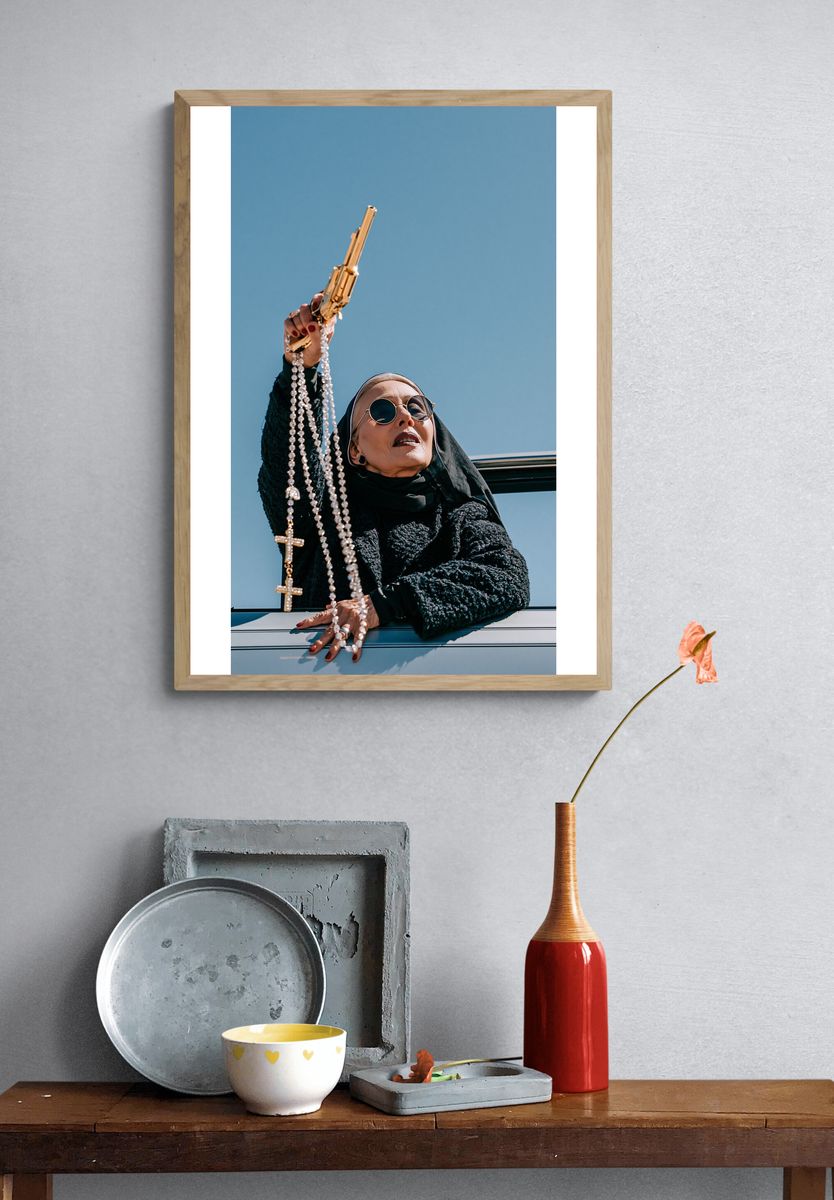 Nun with Gold Gun Photography Poster. — room view 3