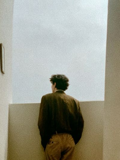 Solitary Figure in Minimal Interior Poster.