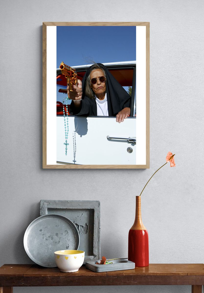 Nun with Revolver Photography Poster. — room view 3