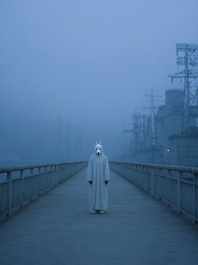 Masked Figure in Fog Poster. poster print