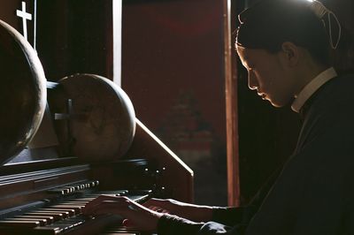 Pianist in Candlelight Photography Poster.