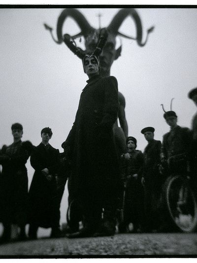 Surreal Masked Figures Photography Poster.