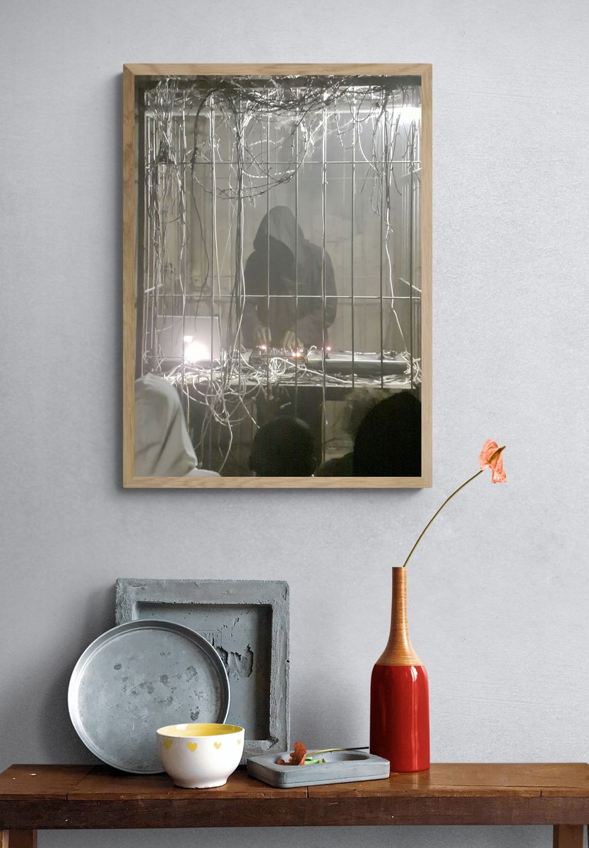 Hooded Figure in Wire Cage Poster. — room view 3