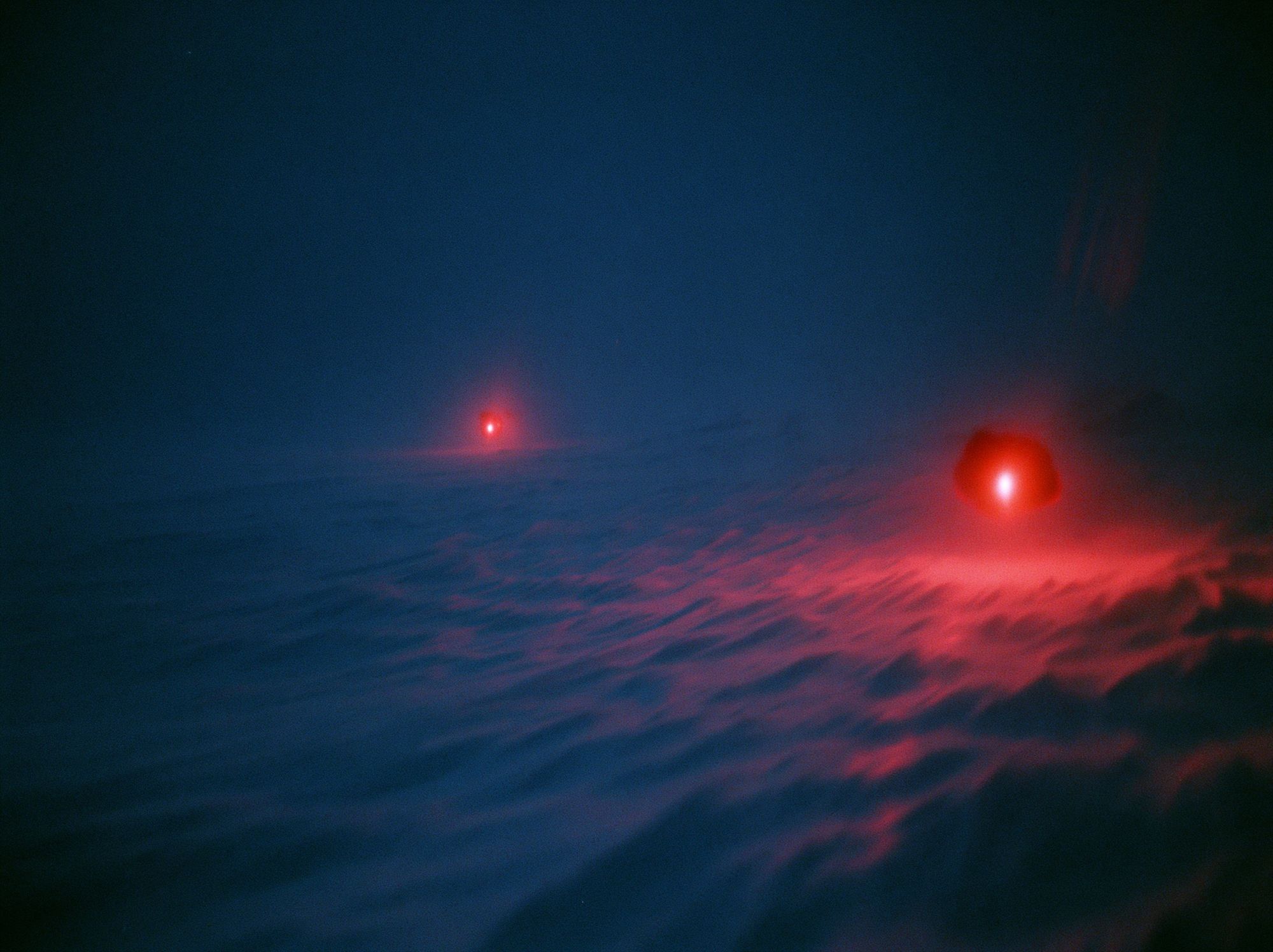 Red Lights in Fog Photography Poster. poster detail