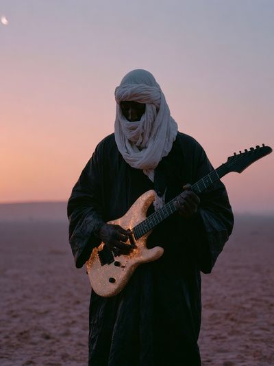 Desert Guitarist Photography Poster.
