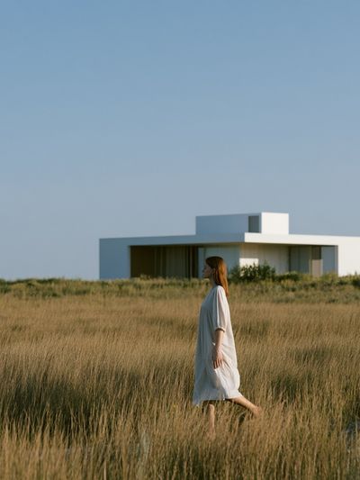 Coastal House in Grassland Photography Poster. poster