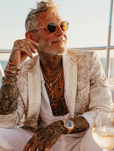 Tattooed Gentleman on Yacht Photography Poster.