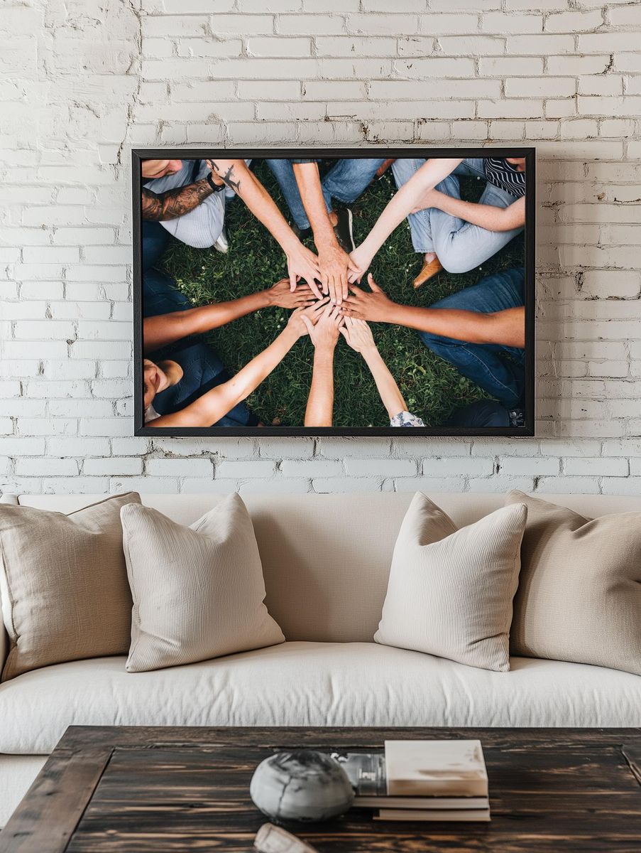 People stacking hands together park. — room view 1