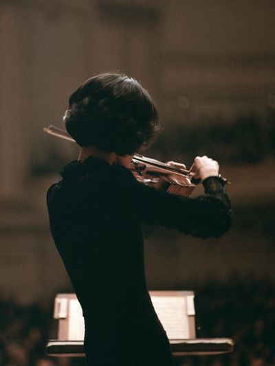 Violinist on Stage Photography Poster.