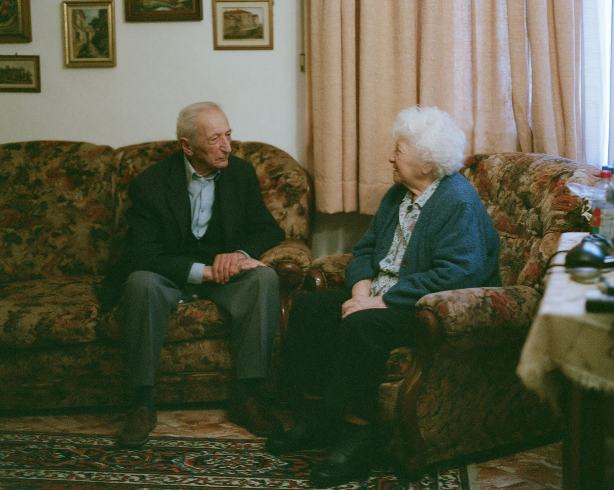 Elderly Couple in Living Room Photography Poster. poster — photography art