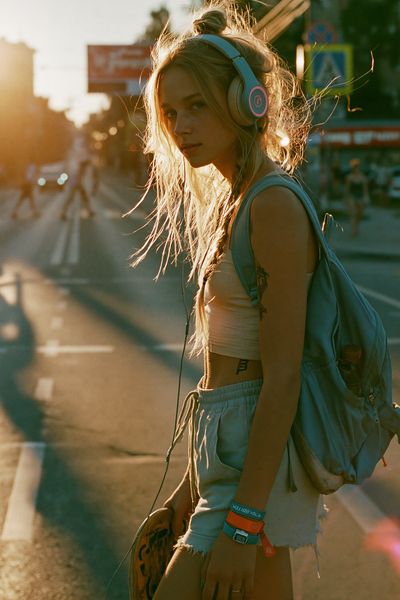 Sunlit Skateboard Girl Photography Poster.