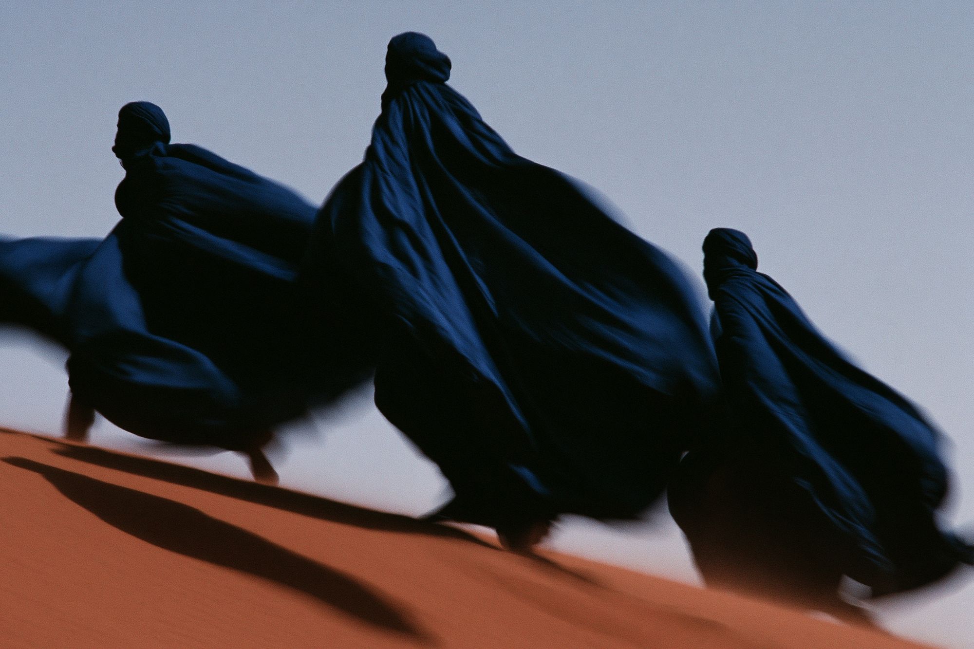 Desert Cloaked Figures Photography Poster. poster — photography art