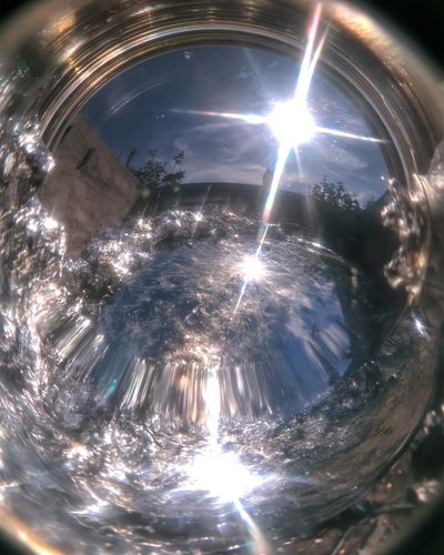 Sunlit Water Ripple Photography Poster.