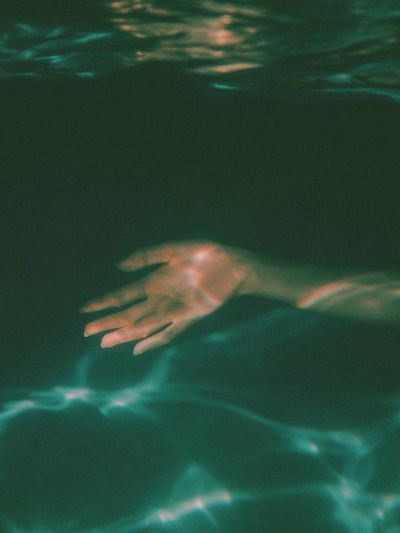 Submerged Hand Photography Poster.