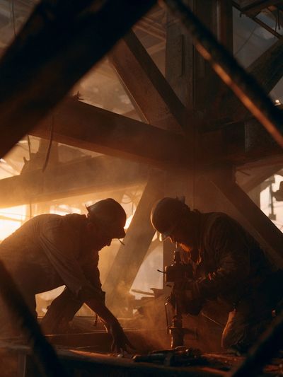 Industrial Workers at Sunset Poster.