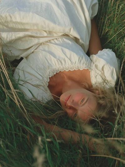 Woman in Meadow Photography Poster. poster