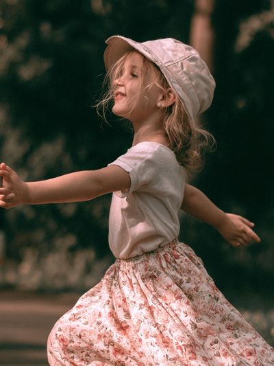 Joyful Child in Garden Photography Poster. poster