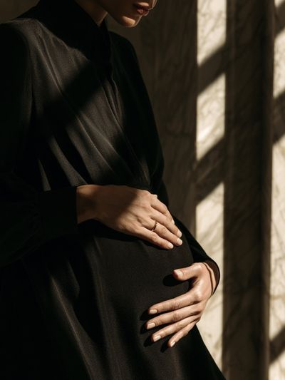 Pregnant Woman in Shadow Photography Poster. poster print