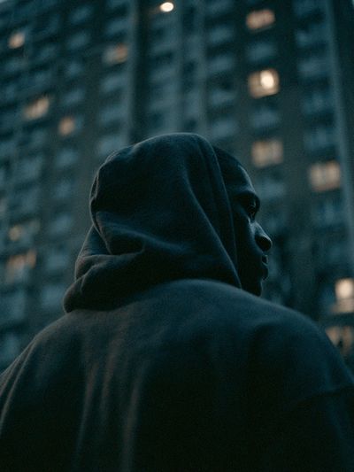 Hooded Figure at Dusk Poster.