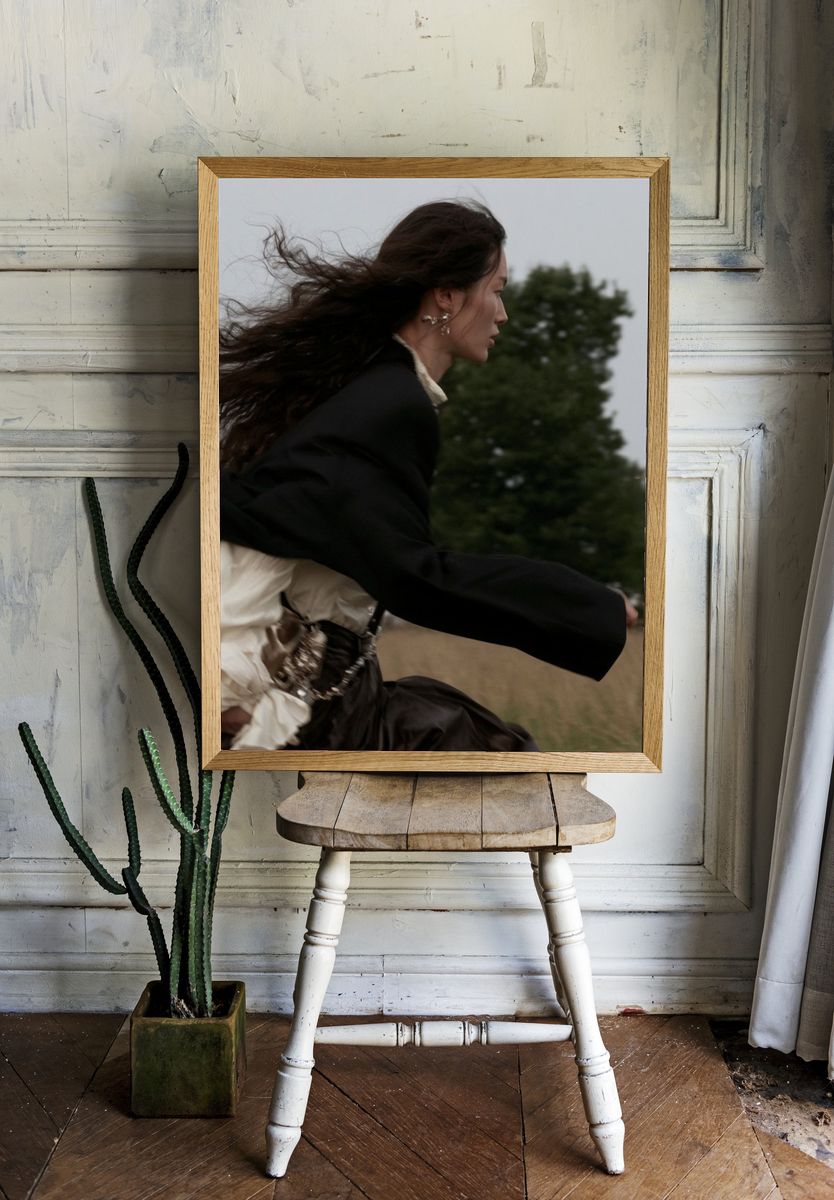 Windblown Woman Portrait Poster. room preview