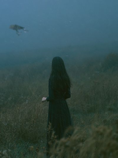 Misty Woman in Field Photography Poster. poster