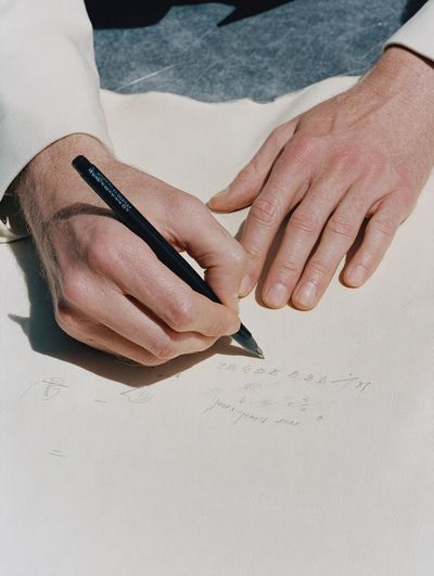 Hands Writing on Paper Photography Poster.