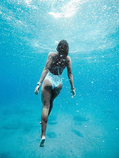 Woman swimming water. poster print