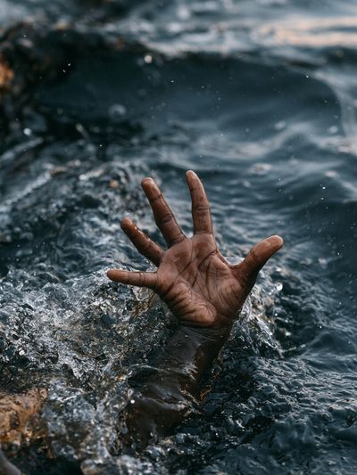 Drowning Hand Photography Poster.