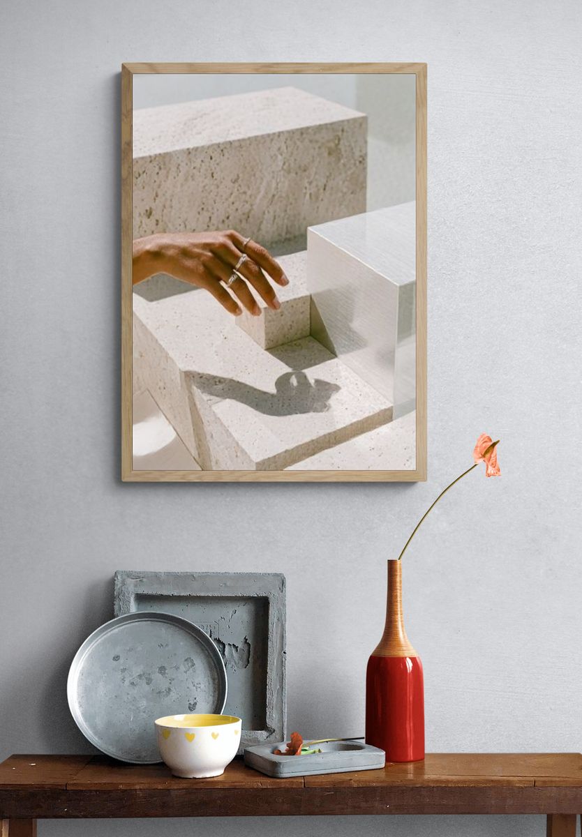 Hand and Stone Blocks Photography Poster. — room view 3
