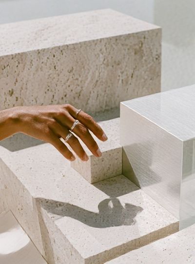 Hand and Stone Blocks Photography Poster. poster