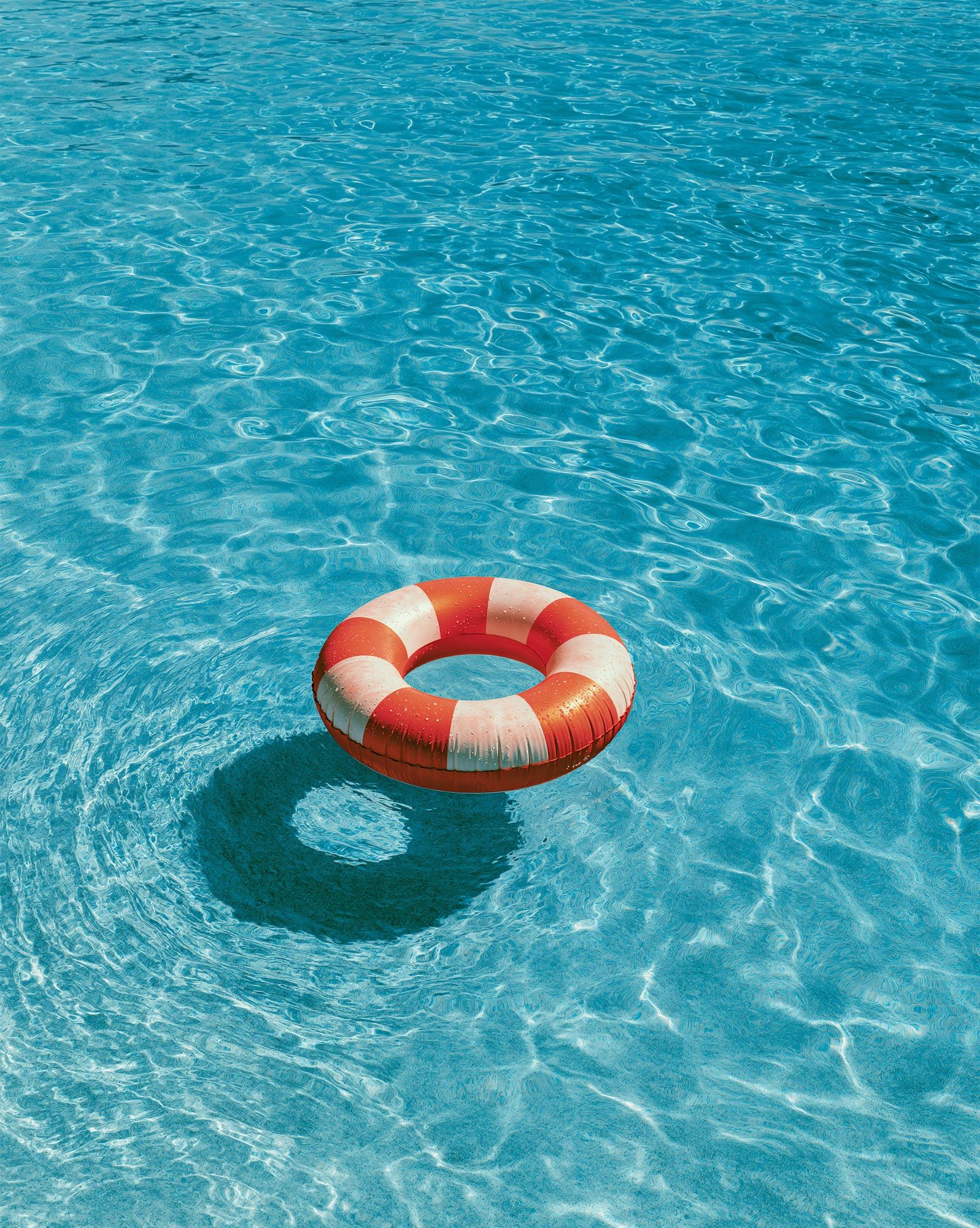 Lifebuoy in Blue Water Photography Poster. poster detail