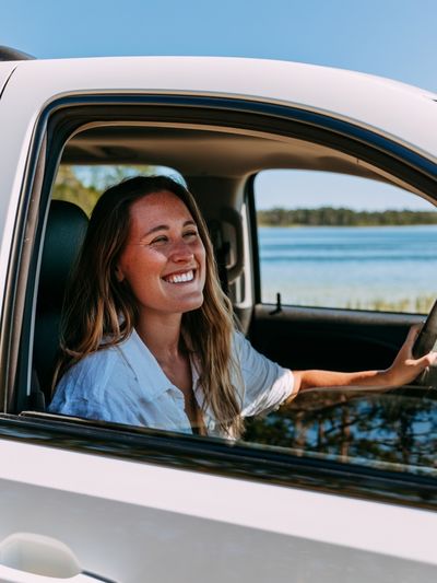 Smiling Woman in Car Photography Poster.