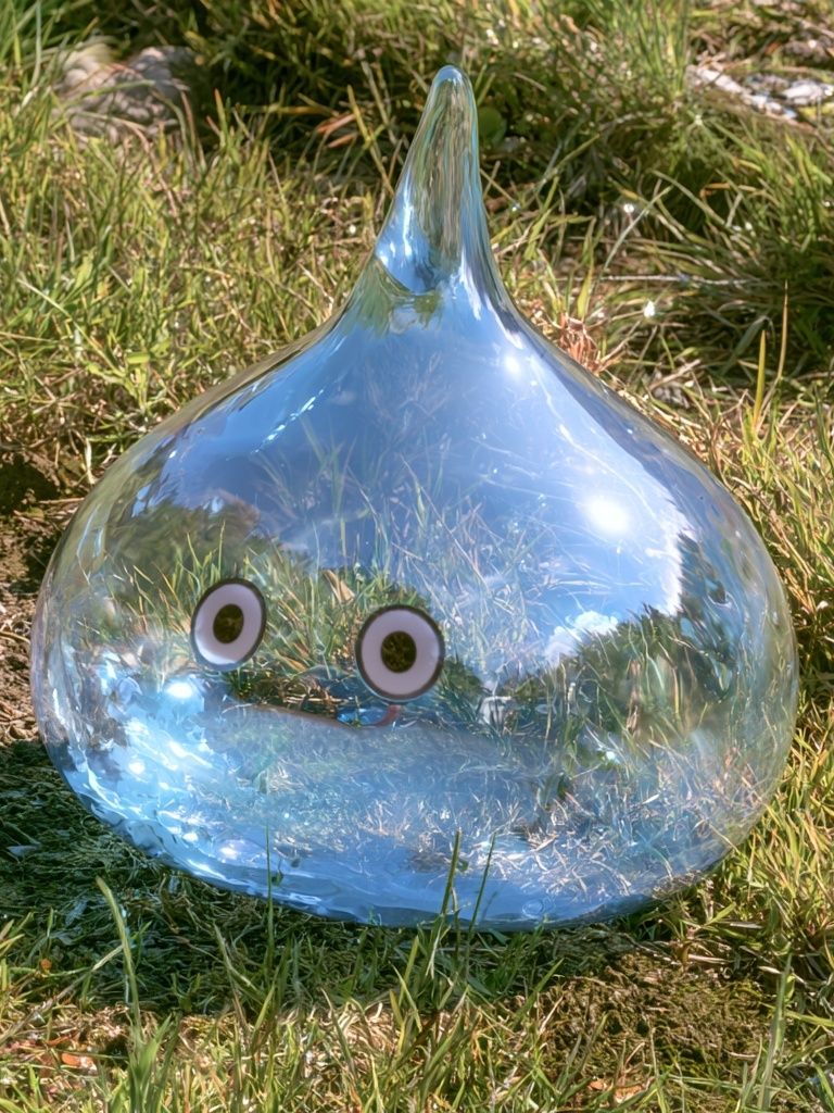 Glass Slime in Grass Photography Poster. poster detail