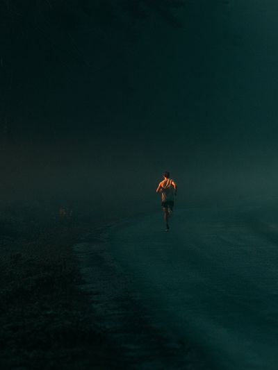 Solitary Runner in the Mist Poster. poster