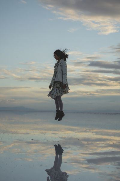 Floating Girl at Dusk Photography Poster.
