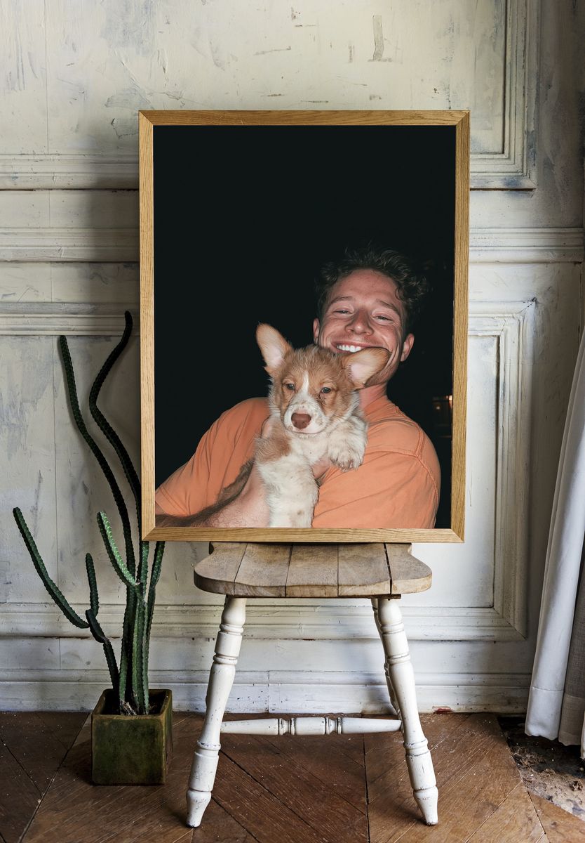 Smiling Man with Puppy Portrait Poster. room preview