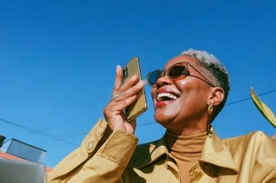 Joyful Woman in Sunlight Photography Poster. poster