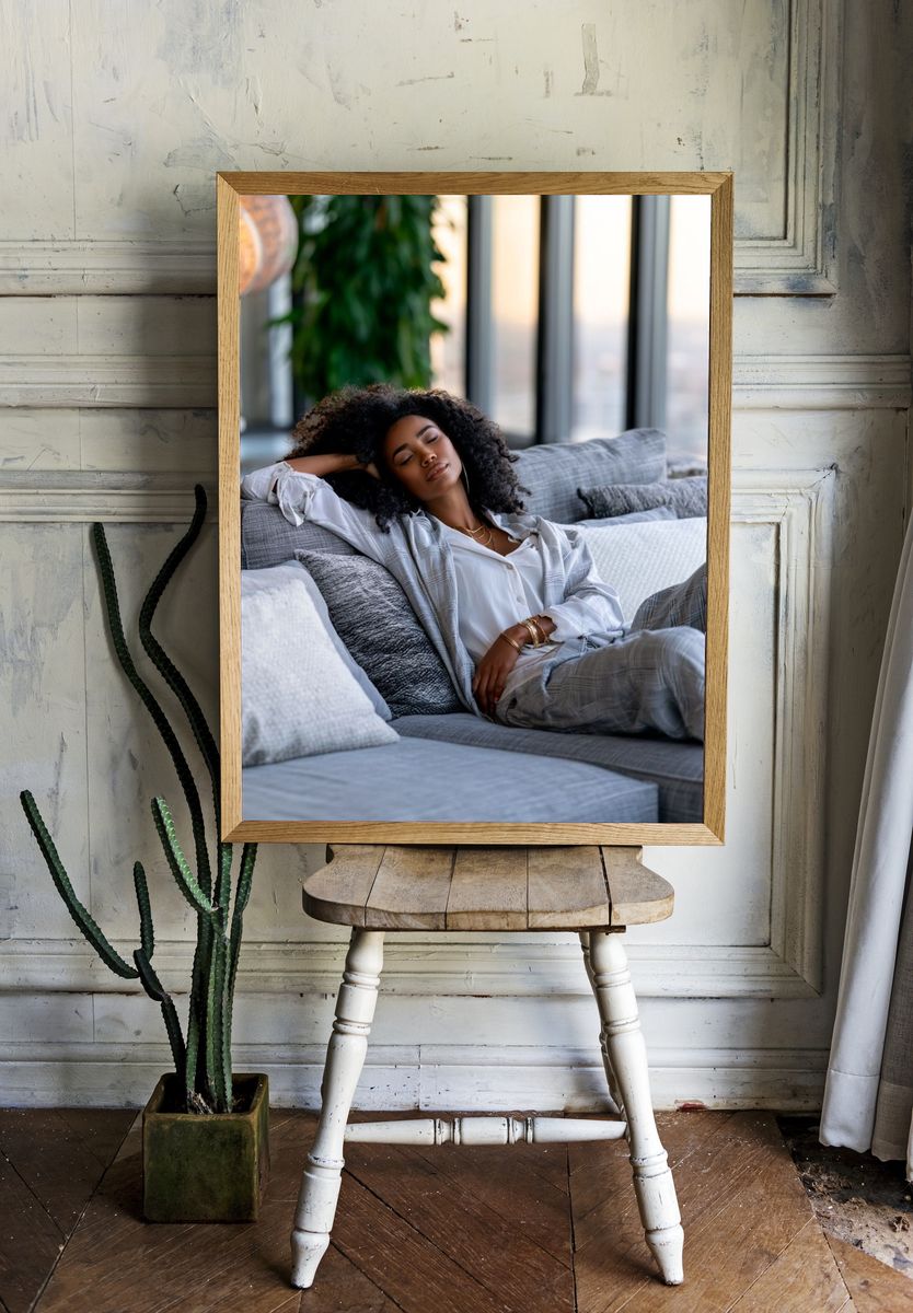 Relaxed Woman on Sofa Photography Poster. — room view 1