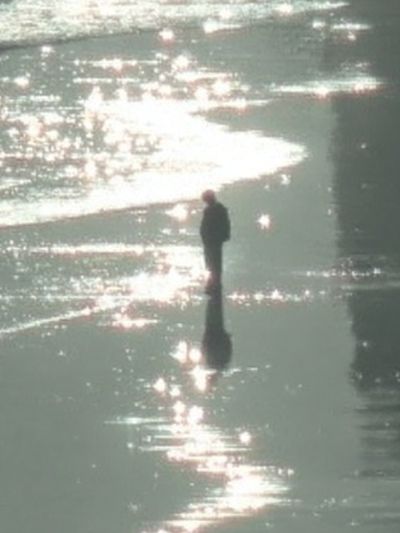 Solitary Figure on Water Photography Poster.