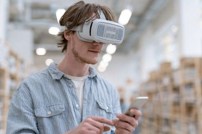 VR Warehouse Worker Photography Poster. poster